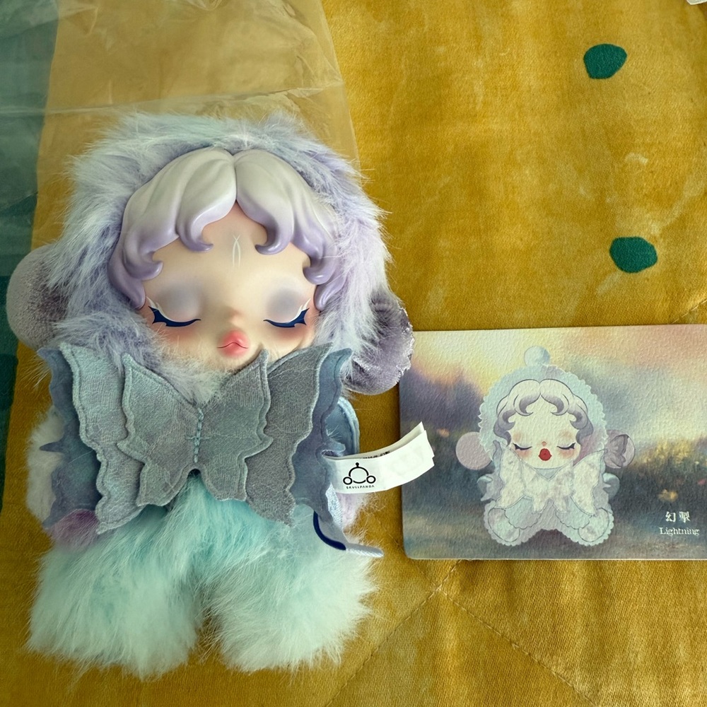Popmart eSKULLPANDA
L'impressionnism e Series Plush
Doll Lightning